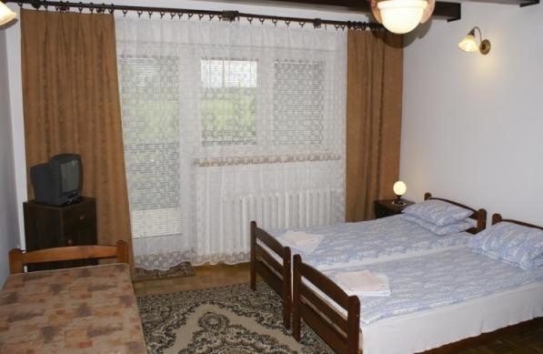 Ferienwohnung Pensjonacik Albatros Mikołajki Zimmer foto